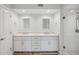 Bright bathroom with double vanity, marble countertops, and walk-in shower at 960 Starkey Rd # 10301, Largo, FL 33771