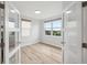 Bright bedroom with hardwood floors, glass double doors and beautiful golf course views at 960 Starkey Rd # 10301, Largo, FL 33771