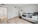 Bright bedroom features wood floors, white trim, and a double closet at 960 Starkey Rd # 10301, Largo, FL 33771