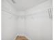Walk-in closet features white wire shelving and lots of storage space at 960 Starkey Rd # 10301, Largo, FL 33771