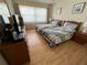 Charming bedroom featuring two twin beds and natural light at 1235 S Highland Ave # 3-303, Clearwater, FL 33756