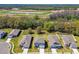 A beautiful aerial view of a community with lush landscaping at 1255 Kazaz Ct, Zephyrhills, FL 33540