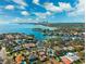 An aerial view showcasing the neighborhood, waterways, and downtown skyline at 1370 Brightwaters Ne Blvd, St Petersburg, FL 33704