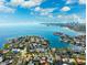 An aerial view showcasing the neighborhood, waterways, and downtown skyline at 1370 Brightwaters Ne Blvd, St Petersburg, FL 33704