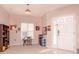 Bright living room with neutral walls, natural light, and tile flooring at 25925 Terrawood Loop, Land O Lakes, FL 34639
