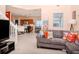 Open concept layout with a kitchen bar, breakfast nook, living area and neutral walls at 25925 Terrawood Loop, Land O Lakes, FL 34639