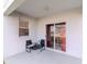 Covered patio featuring an outdoor seating area with a view of the backyard at 25925 Terrawood Loop, Land O Lakes, FL 34639