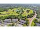 Beautiful aerial view of townhomes near a well-maintained golf course at 3151 Landmark Dr # 123, Clearwater, FL 33761