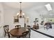 Cozy dining room space with direct access to the living room and kitchen areas at 3151 Landmark Dr # 123, Clearwater, FL 33761