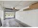 Garage interior featuring ample shelving and access to the outdoors at 3151 Landmark Dr # 123, Clearwater, FL 33761