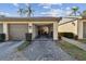 Spacious two-car garage with an open door and a smooth concrete driveway at 3151 Landmark Dr # 123, Clearwater, FL 33761