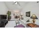 Bright open living room area with dining room access and comfortable seating area at 3151 Landmark Dr # 123, Clearwater, FL 33761