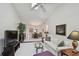 Spacious living room with vaulted ceilings and access to the dining room at 3151 Landmark Dr # 123, Clearwater, FL 33761