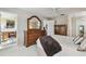Spacious main bedroom featuring neutral walls, carpet flooring, and large closet at 3151 Landmark Dr # 123, Clearwater, FL 33761