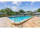 Community pool featuring lounge chairs at 3151 Landmark Dr # 123, Clearwater, FL 33761