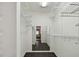 Walk-in closet with a view into the bedroom at 3151 Landmark Dr # 123, Clearwater, FL 33761