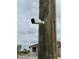 Exterior security camera mounted to a utility pole for added security measures on property at 493 Omen St, Punta Gorda, FL 33982