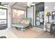 Cozy covered lanai with cushioned chaise lounge, ideal for enjoying the outdoors in comfort at 5565 Salem Square N Dr, Palm Harbor, FL 34685