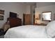 A well-lit bedroom features traditional decor and plenty of natural light at 5565 Salem Square N Dr, Palm Harbor, FL 34685