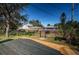 Spacious wooden deck and fenced backyard with a lush green lawn at 2835 Freemont S Ter, St Petersburg, FL 33712