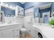 Bathroom features vanity, mirror, toilet, and tub with shower at 10532 94Th Pl, Seminole, FL 33772