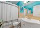 Tiled bathroom with shower/tub, vanity, and toilet at 10532 94Th Pl, Seminole, FL 33772