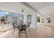 Dining area featuring water views, stylish lighting, and charming decor at 10532 94Th Pl, Seminole, FL 33772