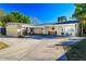 Charming single-story home with a porte-cochere and well-maintained landscaping offering great curb appeal at 10532 94Th Pl, Seminole, FL 33772
