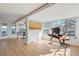 Bright sunroom perfect for a home office, with lovely lake views at 10532 94Th Pl, Seminole, FL 33772