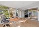 Bright sunroom perfect for a home office, with lovely views at 10532 94Th Pl, Seminole, FL 33772