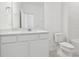 Bright bathroom featuring a modern vanity and fixtures at 1231 Kazaz Ct, Zephyrhills, FL 33540