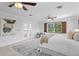 Sun-filled bedroom includes French doors to balcony, wood shutters and neutral accents at 156 29Th N Ave, St Petersburg, FL 33704