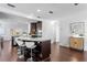 Open-concept kitchen features a breakfast bar with seating and stainless steel appliances at 156 29Th N Ave, St Petersburg, FL 33704