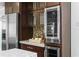 Kitchen with stainless steel appliances and a built-in wine refrigerator at 156 29Th N Ave, St Petersburg, FL 33704