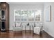 Living area with hardwood floors and plantation shutters, adjacent to the kitchen at 156 29Th N Ave, St Petersburg, FL 33704