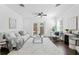 Bright living room with neutral decor, hardwood floors, and French doors to outdoor space at 156 29Th N Ave, St Petersburg, FL 33704