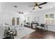 Bright living room with neutral decor, hardwood floors, and French doors to outdoor space at 156 29Th N Ave, St Petersburg, FL 33704