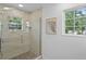 Modern shower featuring glass enclosure and natural light at 156 29Th N Ave, St Petersburg, FL 33704