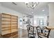 Bright kitchen features bar seating, a breakfast nook and access to other rooms at 206 S Port Royal Ln, Apollo Beach, FL 33572