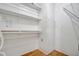 Large walk-in closet with built-in shelving and ample storage space at 206 S Port Royal Ln, Apollo Beach, FL 33572