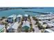 Coastal neighborhood with charming colorful homes, lush palm trees, and convenient access to the bay and the beach at 308 2Nd St N # 202, Bradenton Beach, FL 34217