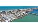 Waterfront community showcasing a variety of properties, a bridge, and stunning ocean views, creating a desirable coastal lifestyle at 308 2Nd St N # 202, Bradenton Beach, FL 34217
