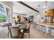 Open concept kitchen with granite counters, a breakfast bar, and adjacent living area at 5501 E Longboat Blvd, Tampa, FL 33615