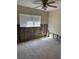 Unfinished basement with partially exposed concrete block walls and a window at 8075 Gulf Blvd, St Pete Beach, FL 33706