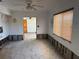 Dining area with natural light and original tile flooring at 8075 Gulf Blvd, St Pete Beach, FL 33706