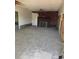 Empty living room featuring a brick fireplace and ceiling fan at 8075 Gulf Blvd, St Pete Beach, FL 33706