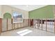 Bright room with new floors, a large window, and space for a flexible design and remodel at 8421 Flagstone Dr, Tampa, FL 33615