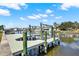 This property has a private boat lift and dock on a waterfront canal at 8421 Flagstone Dr, Tampa, FL 33615