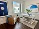 Inviting home office with stylish decor, natural light, and a comfortable seating area at 881 6Th S Ave, St Petersburg, FL 33701