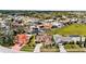 Picture perfect neighborhood with mature trees and manicured lawns, and many homes with screened in pools at 9229 Water Hazard Dr, Hudson, FL 34667